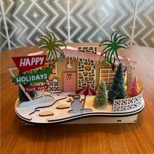 Festive Holiday Scene with Snowman and Trees